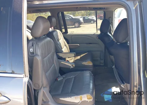 2010 Honda Odyssey Ex-L z USA, uszkodzony, nr VIN 5FNRL3H75AB007238